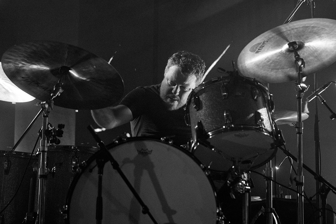 Leon Power hitting the cymbals